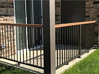 <b>Wood Grain Handrail on Aluminum Balcony Railing at Franklin Square</b>